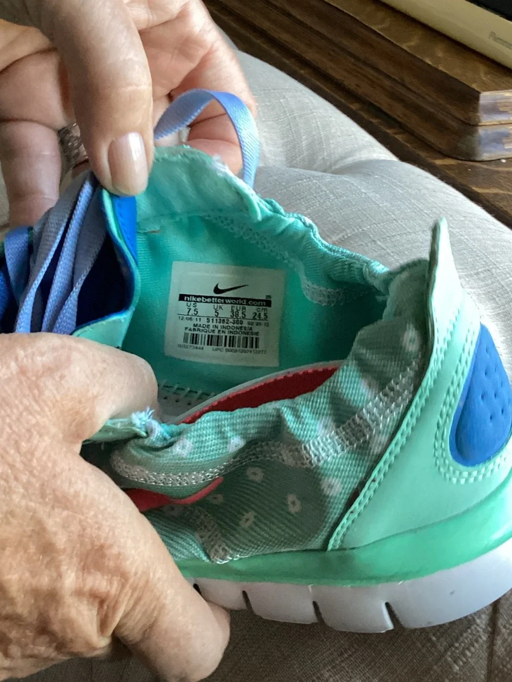 Nike Mint Green Polka Dot Running Sneakers with Coral Swoosh and Blue Laces